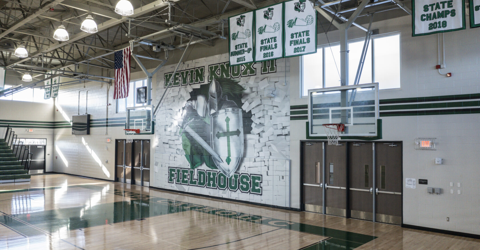 Interior detail shot of mural in the Tampa Catholic basketball court